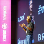 Henry Chang, CEO of Wemade, delivers a keynote at ‘KBW2023: IMPACT’